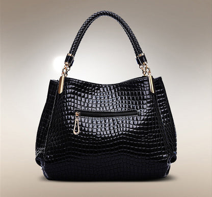 Xella | Elegante bolso con motivo de cocodrilo.