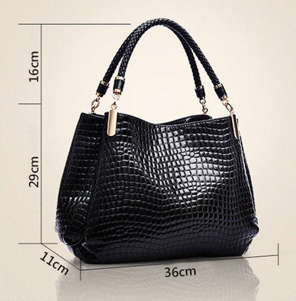 Xella | Elegante bolso con motivo de cocodrilo.