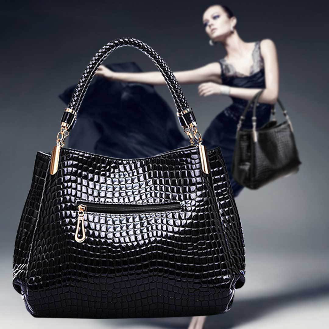 Xella | Elegante bolso con motivo de cocodrilo.
