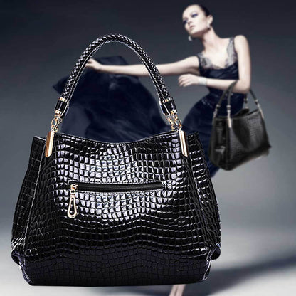 Xella | Elegante bolso con motivo de cocodrilo.