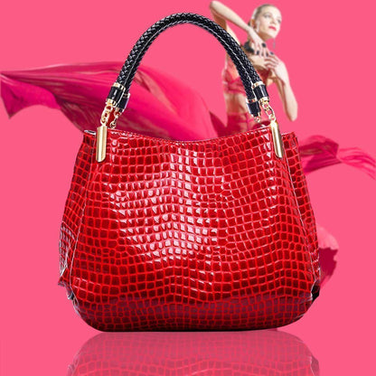 Xella | Elegante bolso con motivo de cocodrilo.